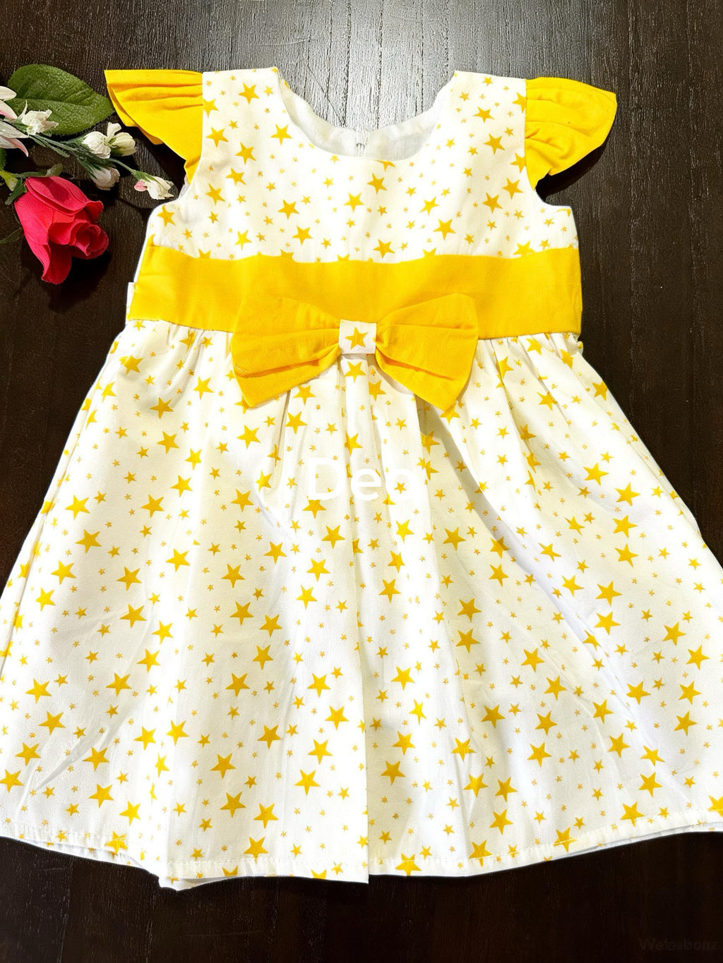 Yellow stared frock